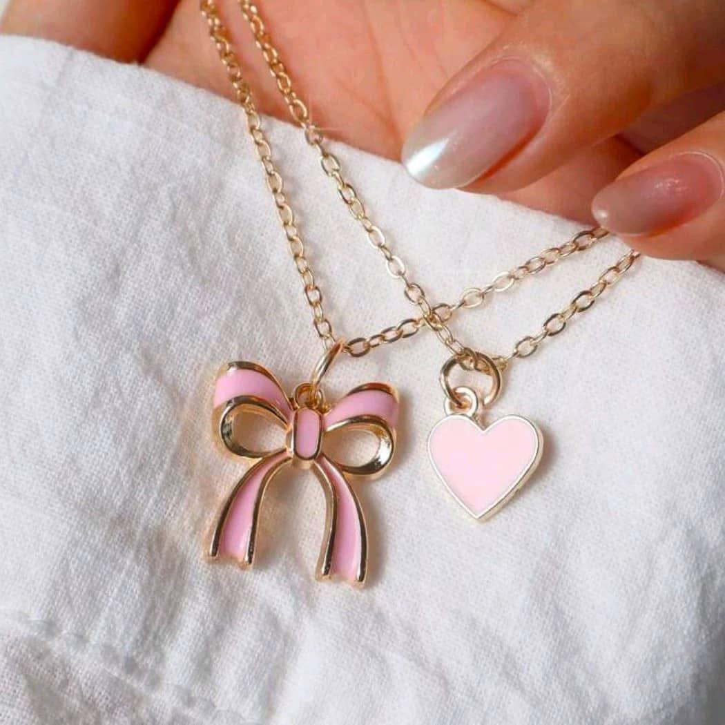 Heart and bow necklace