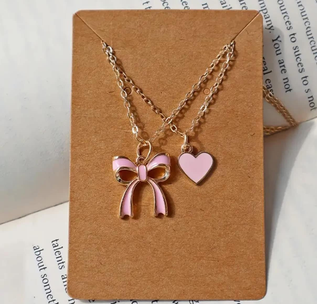 Heart and bow necklace