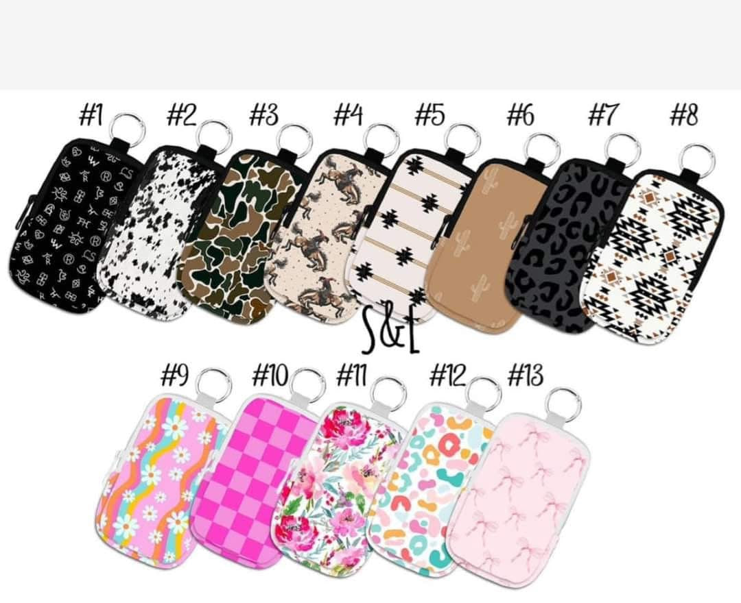 Spray sanitizer/accessory zipper keychain bag